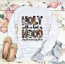 HOLY WITH A HINT OF HOOD